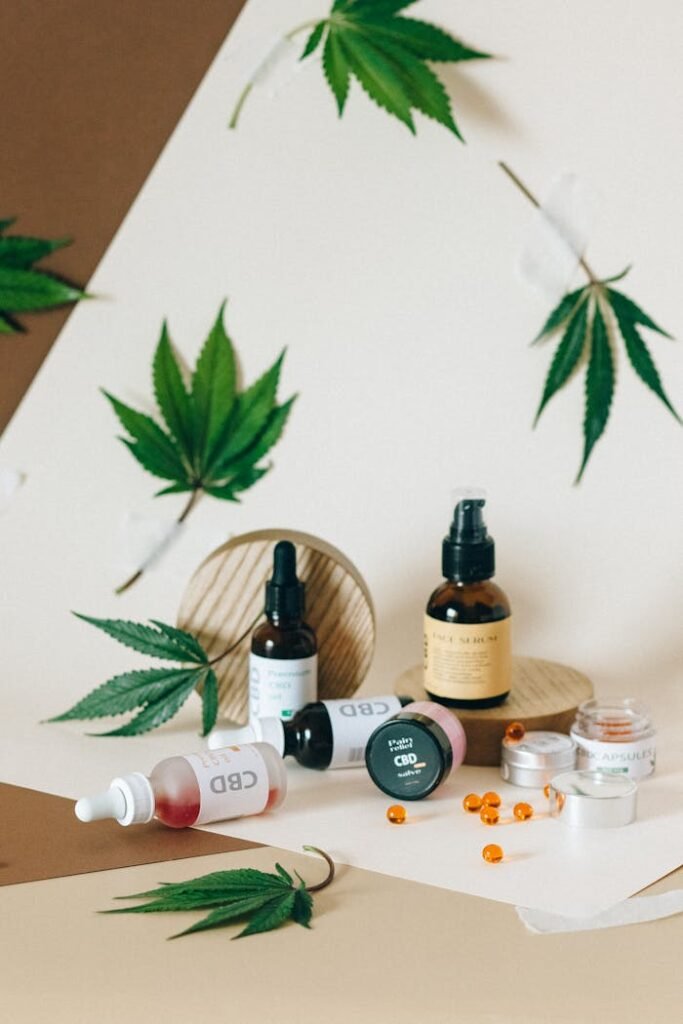 An Assortment of CBD Products and Cannabis Leaves